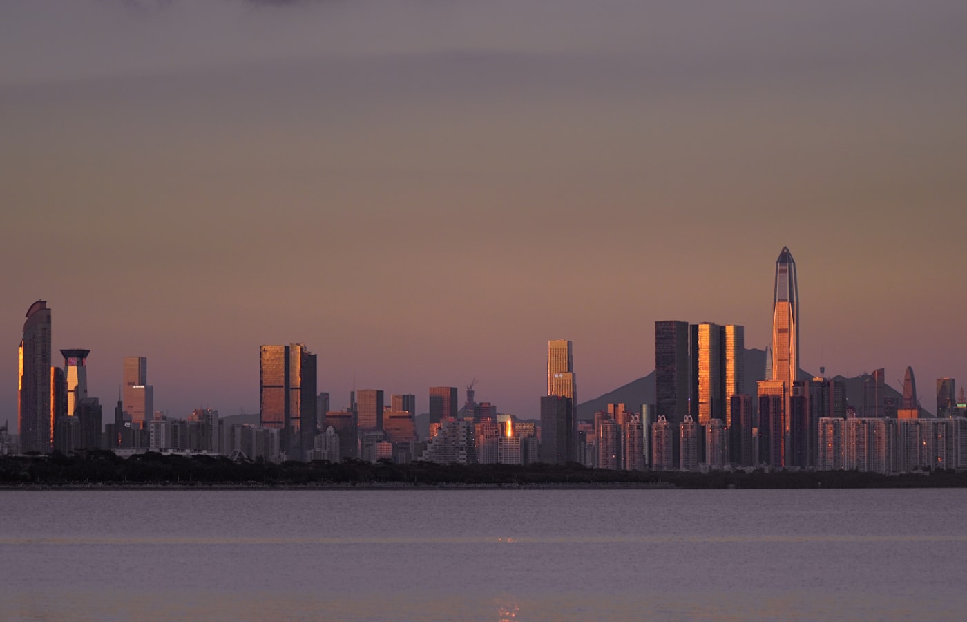 Shenzhen skyline beside the bay at sunset